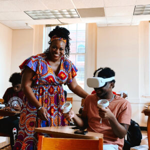 Instructor Teaching students wearing Meta Quest 2 VR Headsets for Education
