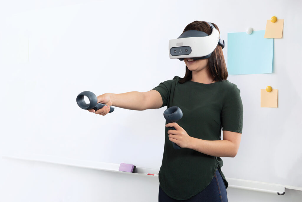 Woman in HTC Vive Focus Plus VR learning objects