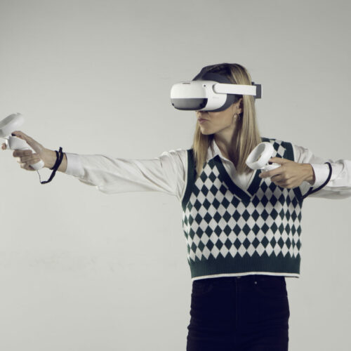 Woman wearing HTC Vive Focus 3 Virtual Reality Headset