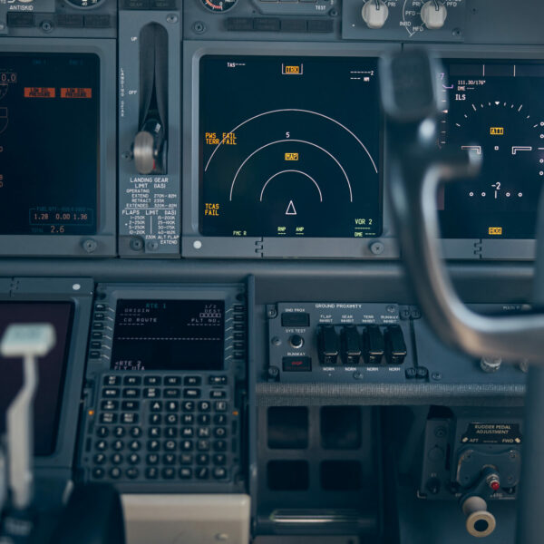 Cockpit of passenger airplane with flight instruments, displays and navigational systems